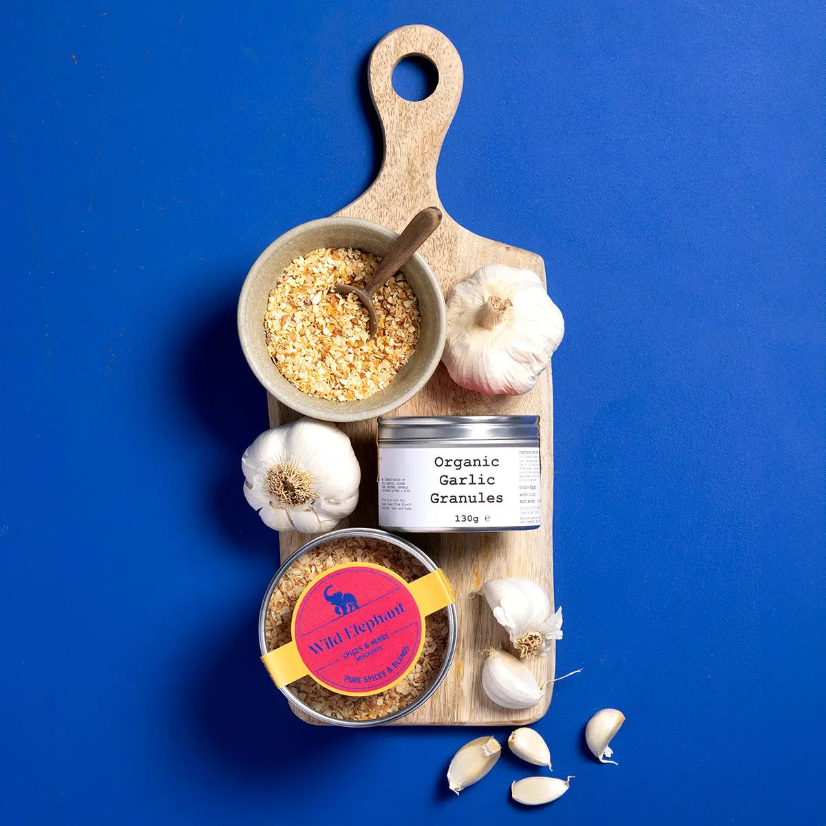 Wild Elephant Organic Garlic Granules in a clear jar, showing fine, white garlic spice granules for herbs and spices cooking.