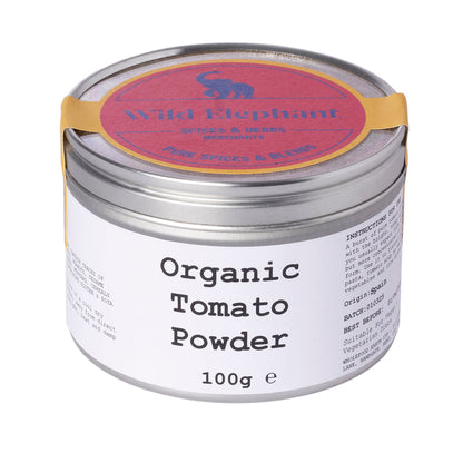 Organic tomato powder from Wild Elephant, a Whole Food Earth herbs and spices product, shown in a clear, close-up image.