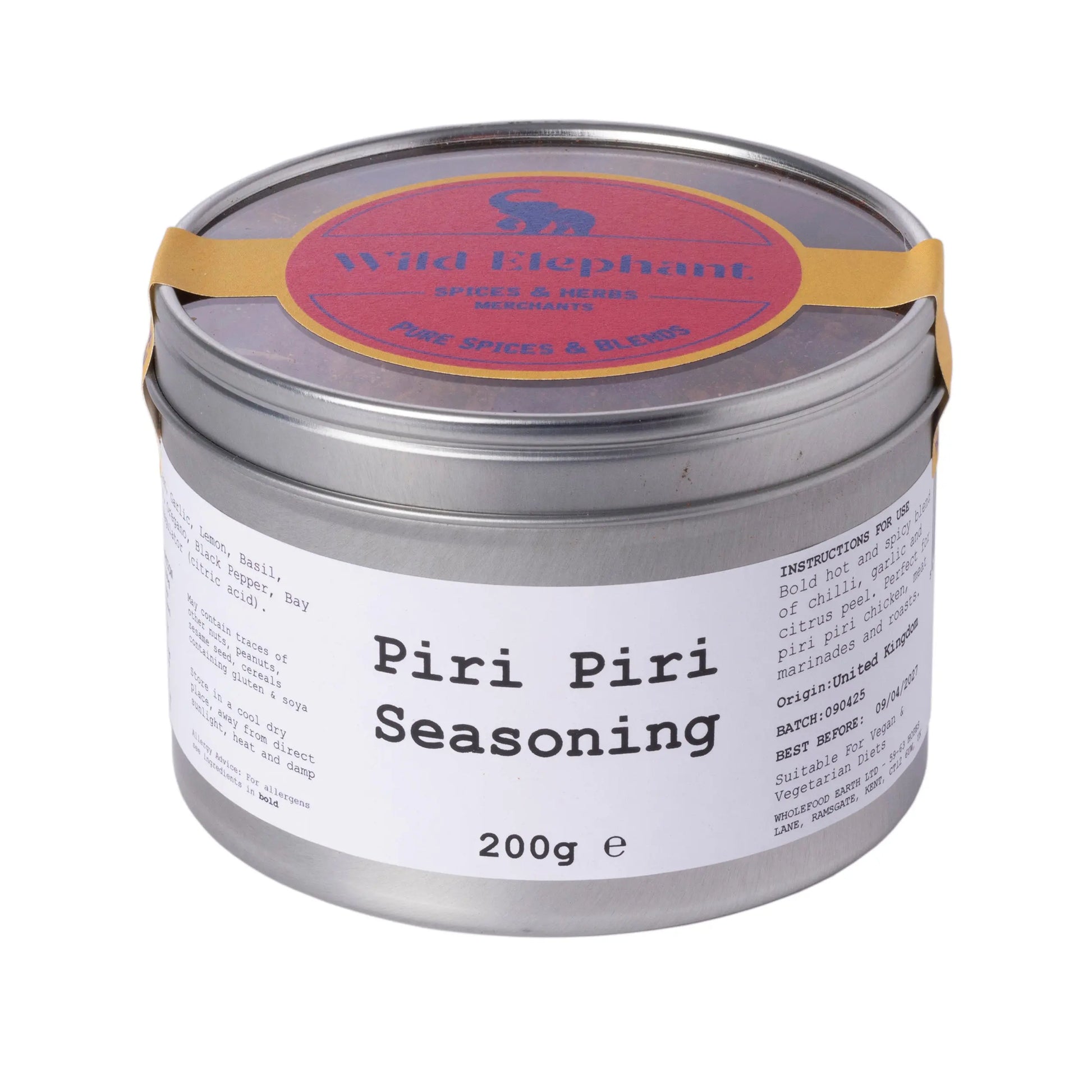 Wild Elephant Piri Piri Seasoning by Whole Food Earth in a spice jar with vibrant red seasoning and label.