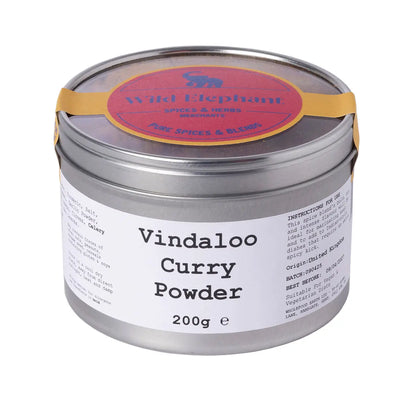 Wild Elephant Vindaloo Curry Powder from Whole Food Earth, vibrant spice blend for flavorful Indian dishes, in a colorful jar.