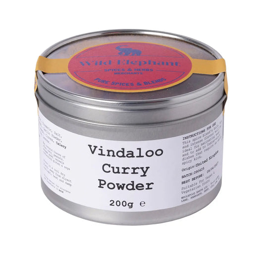 Wild Elephant Vindaloo Curry Powder from Whole Food Earth, vibrant spice blend for flavorful Indian dishes, in a colorful jar.