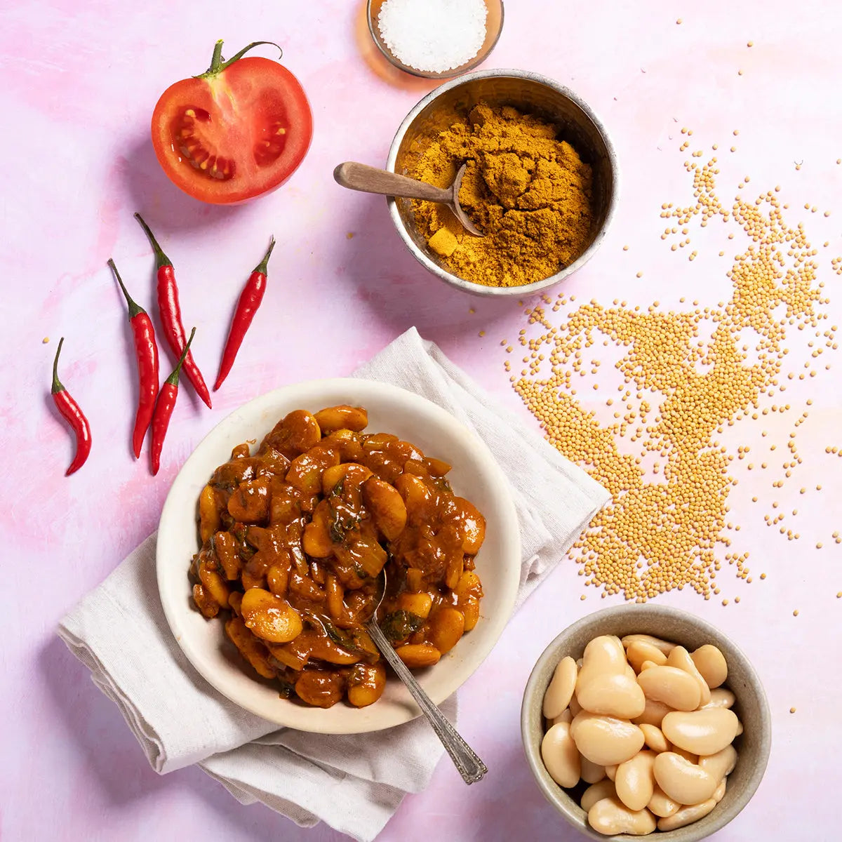 Wild Elephant Vindaloo Curry Powder in a jar, a flavorful spice blend from Whole Food Earth for Indian cuisine.