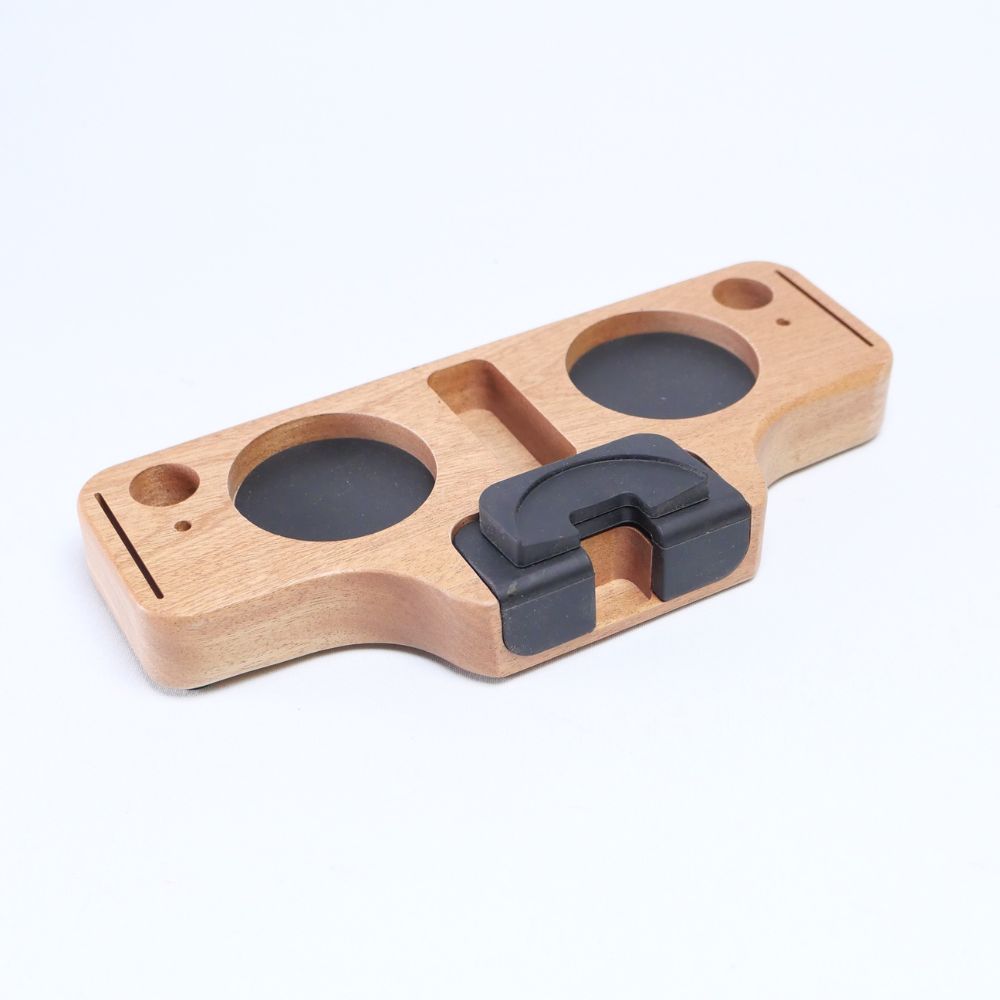 Wooden portafilter holder and espresso tamper station by KNOCDIC® with a sleek wooden design for barista organization.