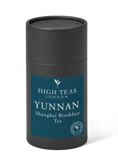 High Teas Yunnan Imperial "Gold Tip" loose leaf Shanghai Breakfast Tea, golden tips and dark leaves in a traditional tea presentation.