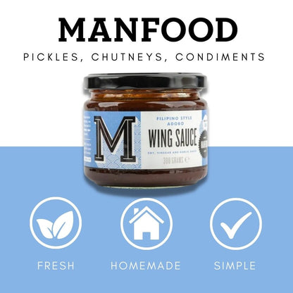 Bottle of Manfood Adobo Wing Sauce showing the label and dark reddish-brown sauce inside the bottle.