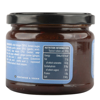 Manfood Adobo Wing Sauce in a jar, featuring a rich, spicy sauce with a dark, glossy appearance, perfect for wings and marinades.