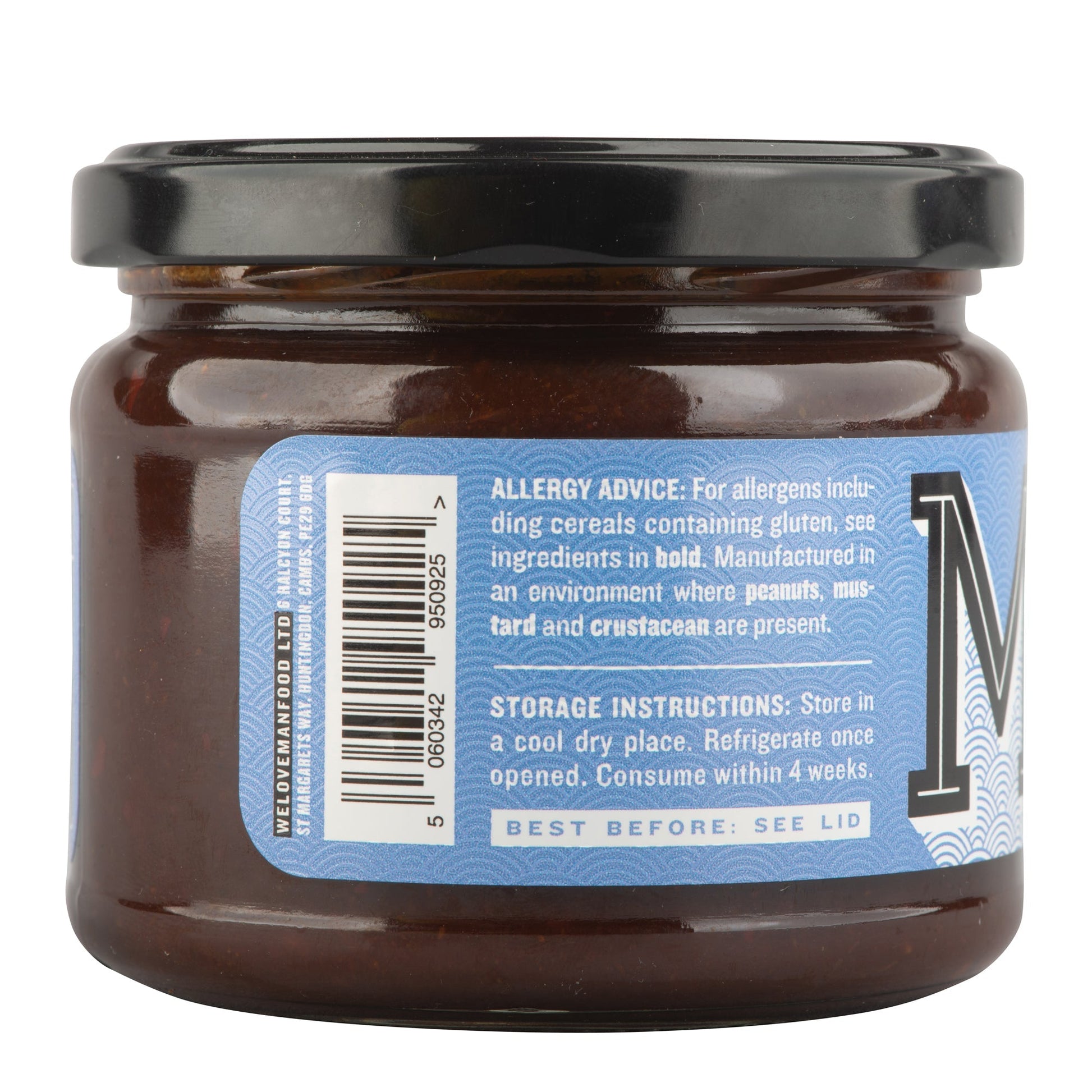 Manfood Adobo Wing Sauce in a bottle, showcasing its rich, flavorful sauce ideal for wings and grilling.