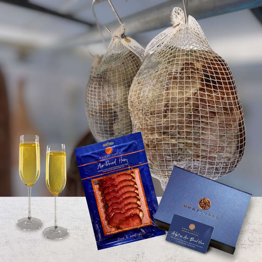 Bray Cured air-dried ham gift card for charcuterie experience, featuring boxed packaging and a sliced ham display.