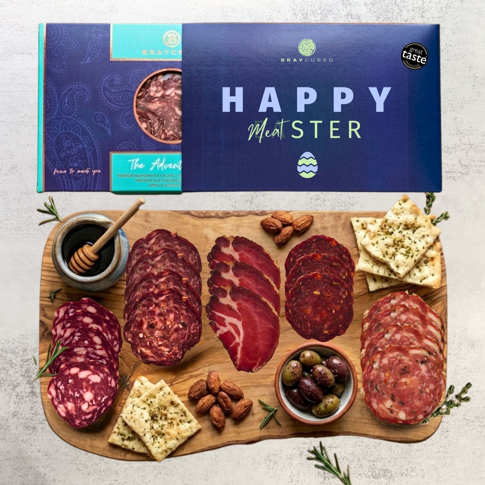 Bray Cured Adventure Feasting Five charcuterie selection on a festive holiday board with Christmas-themed wrapping.