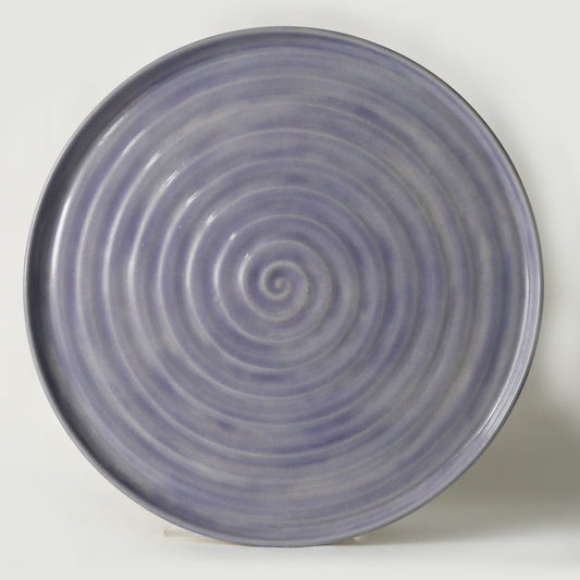 Amethyst purple ceramic dinner plate by Katie L Thompson Designs, featuring a smooth, glossy finish and classic round shape.