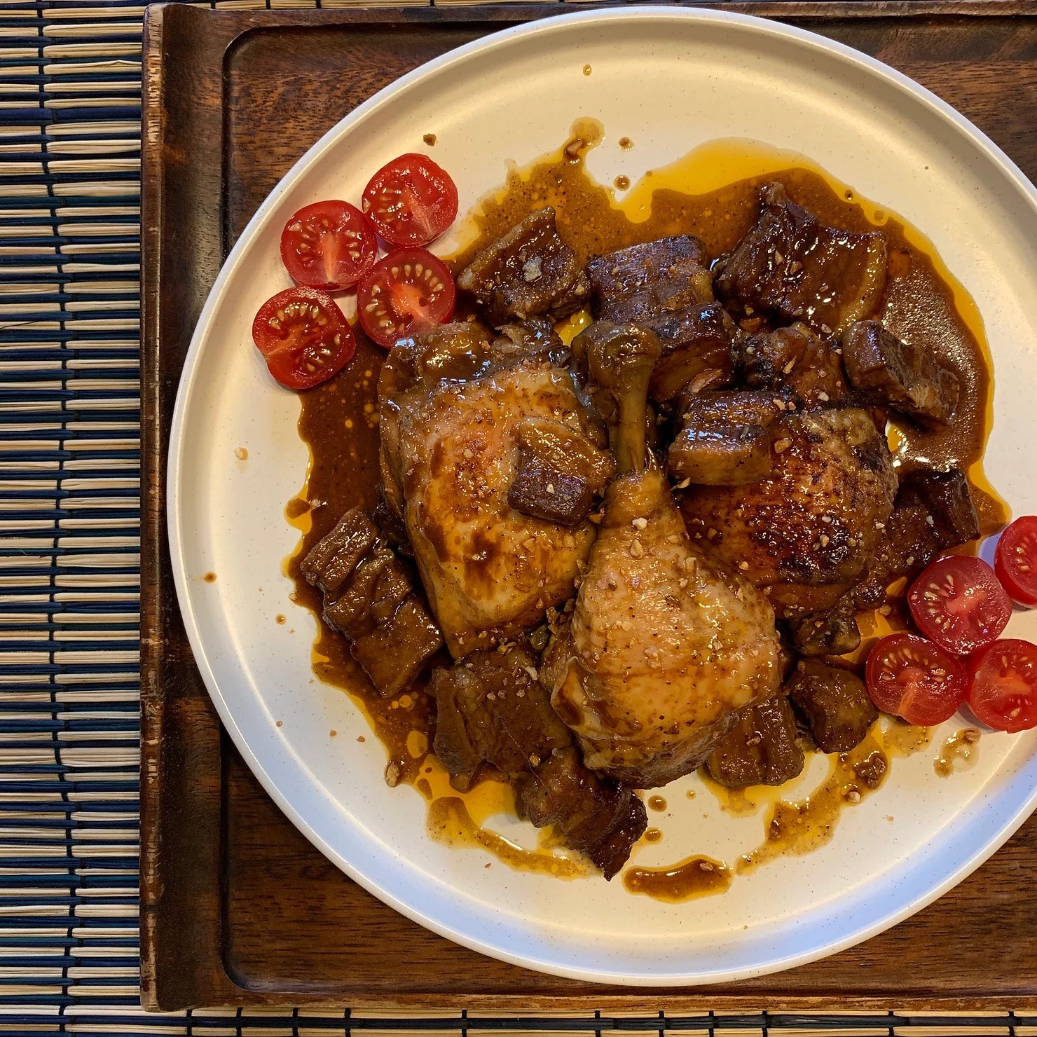 RoniBs Kitchen Filipino style adobo sauce bottle, rich and savory condiment for Philippine cuisine, shown in a close-up image.