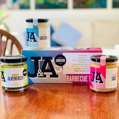 Janda Barbecue Trio gift box with assorted grilling sauces and seasonings, arranged in a decorative box for outdoor cooking.