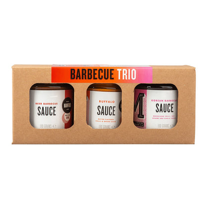 Manfood BBQ Trio gift box with three assorted barbecue sauces and rubs in a stylish packaging.