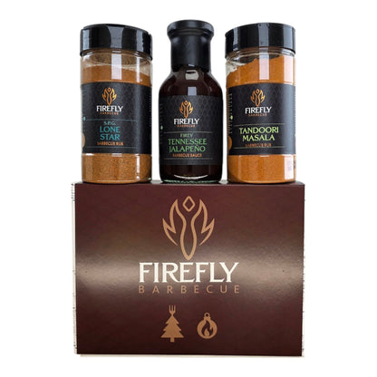 FireFly Barbecue Christmas gift box featuring award-winning BBQ rubs and sauces, perfect for holiday grilling enthusiasts.