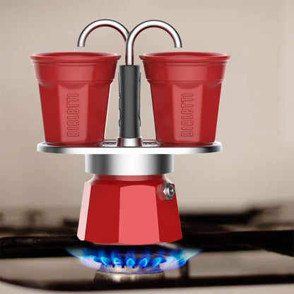 Red Bialetti Mini Express 'R' double serve coffee maker by Brew Italia, compact espresso machine for two cups.