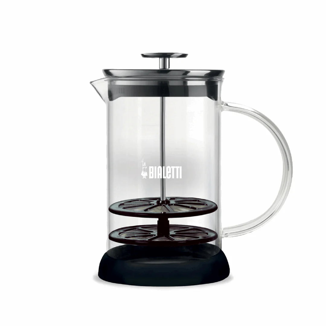 Bialetti Tuttocrema glass milk frother for frothy coffee, featuring a clear glass body and stainless steel handle for easy use.