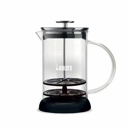 Bialetti Tuttocrema glass milk frother for frothy coffee, featuring a clear glass body and stainless steel handle for easy use.