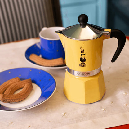 Yellow Bialetti Rainbow aluminium stovetop coffee maker, Brew Italia Moka Express, with a classic design for rich espresso brewing.