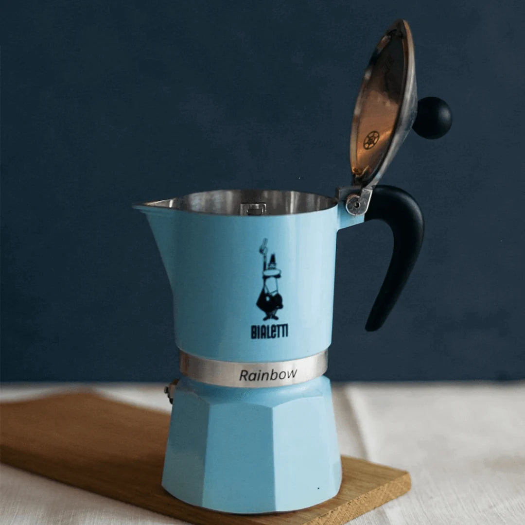 Bialetti Rainbow aluminium stovetop coffee maker with pale blue finish, Brew Italia hardware for brewing espresso.