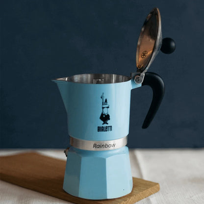 Bialetti Rainbow aluminium stovetop coffee maker with pale blue finish, Brew Italia hardware for brewing espresso.