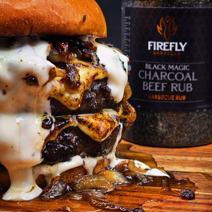 FireFly Barbecue Black Magic Charcoal Beef Rub on a jar label, showcasing a bold seasoning blend for BBQ grilling.
