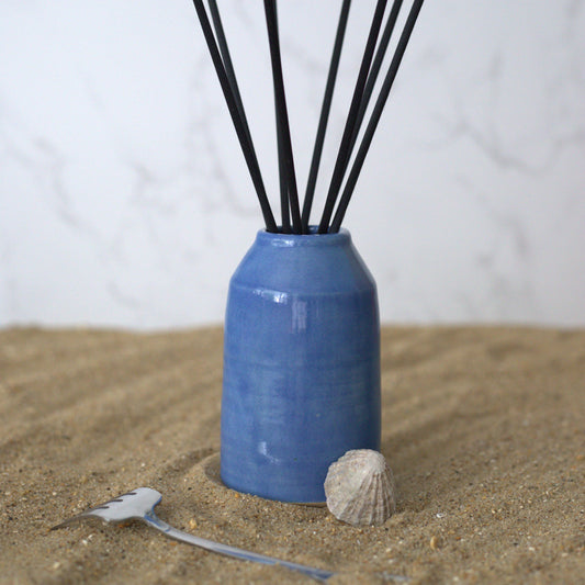Pacific Blue Classic Reed Diffuser by Katie L Thompson Designs featuring a square-shaped blue reed diffuser for home fragrance.