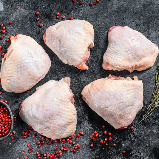 Primrose Herd Creedy Carver free-range boneless chicken thighs, raw and ready for cooking, with skinless and boneless cuts.