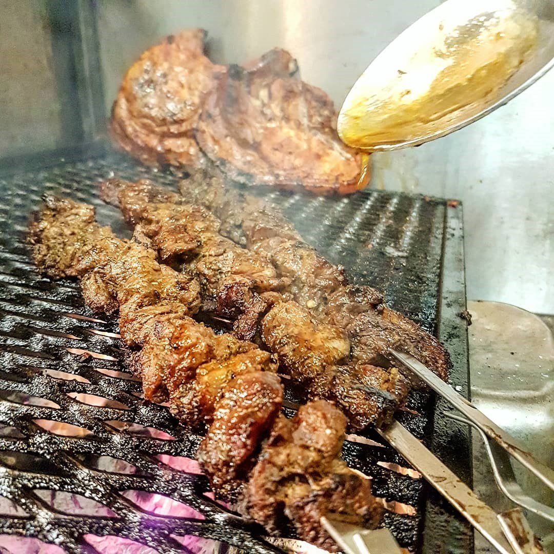FireFly Barbecue Boston Beach Jerk Rub in a jar, showcasing its spicy seasoning blend for grilling and BBQ cooking.