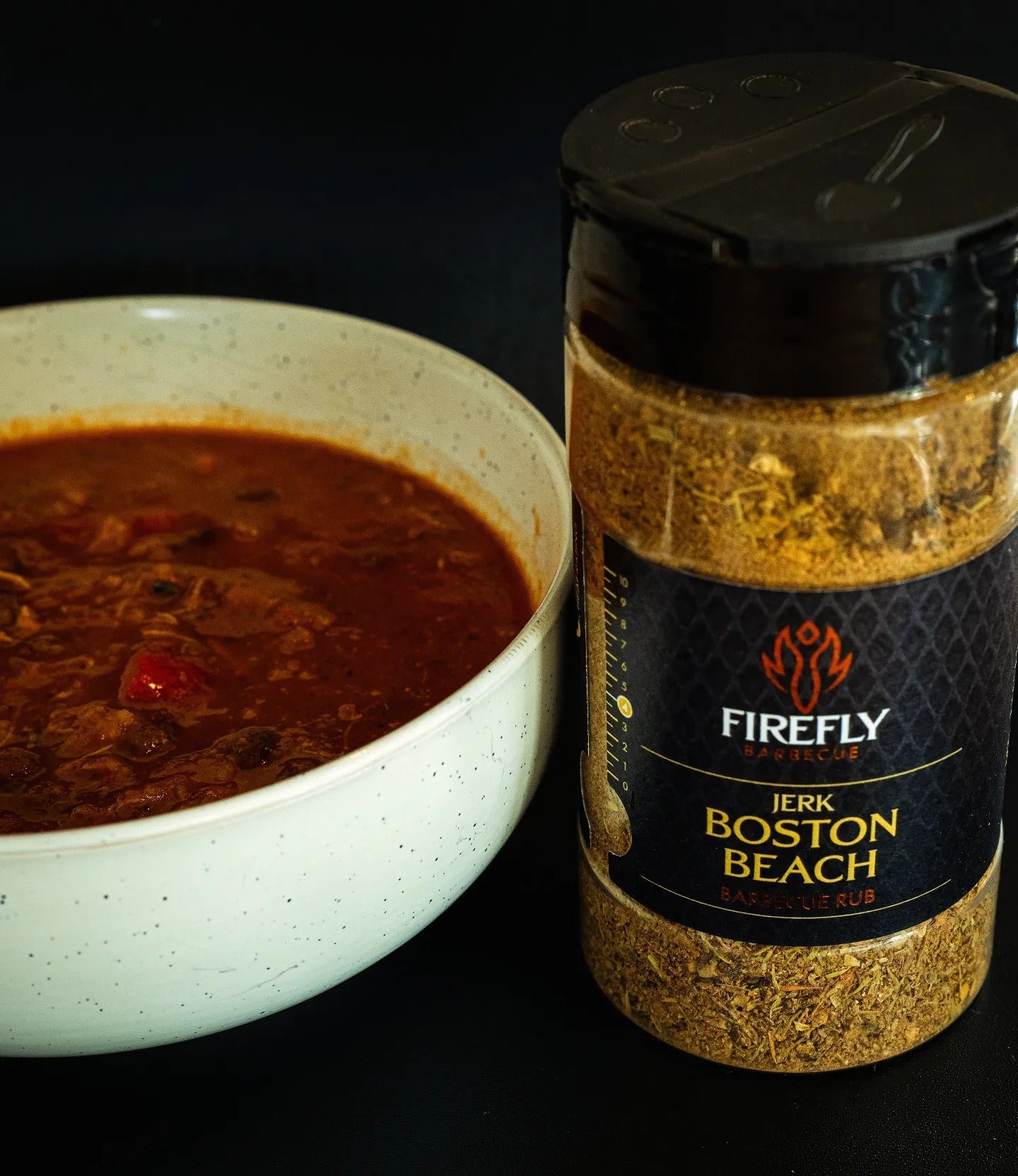FireFly Barbecue Boston Beach Jerk Rub in a jar, spicy and flavorful BBQ rub for grilling and seasoning meats.