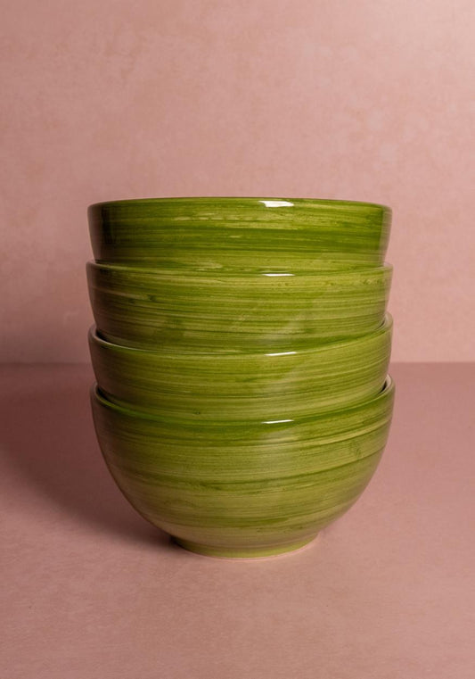 Set of four green Casa by Josephine Jenno Cara Shell cereal bowls with a textured shell design.