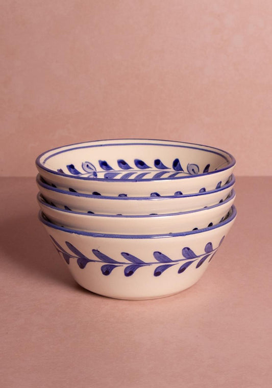 Set of four Pandora cereal bowls in vibrant cobalt blue by Casa by Josephine Jenno, showcasing smooth ceramic design.