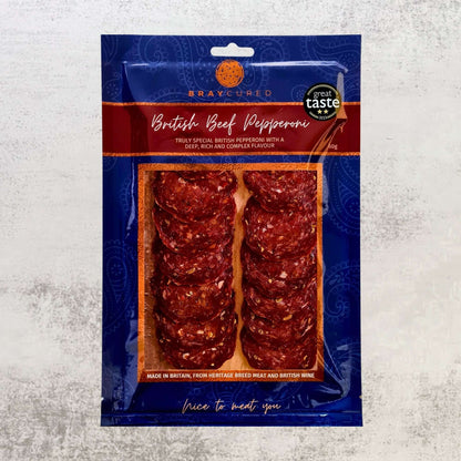 Bray Cured Spicy Feasting Five charcuterie selection with British beef pepperoni pack, showcasing sliced cured meats on a white background.