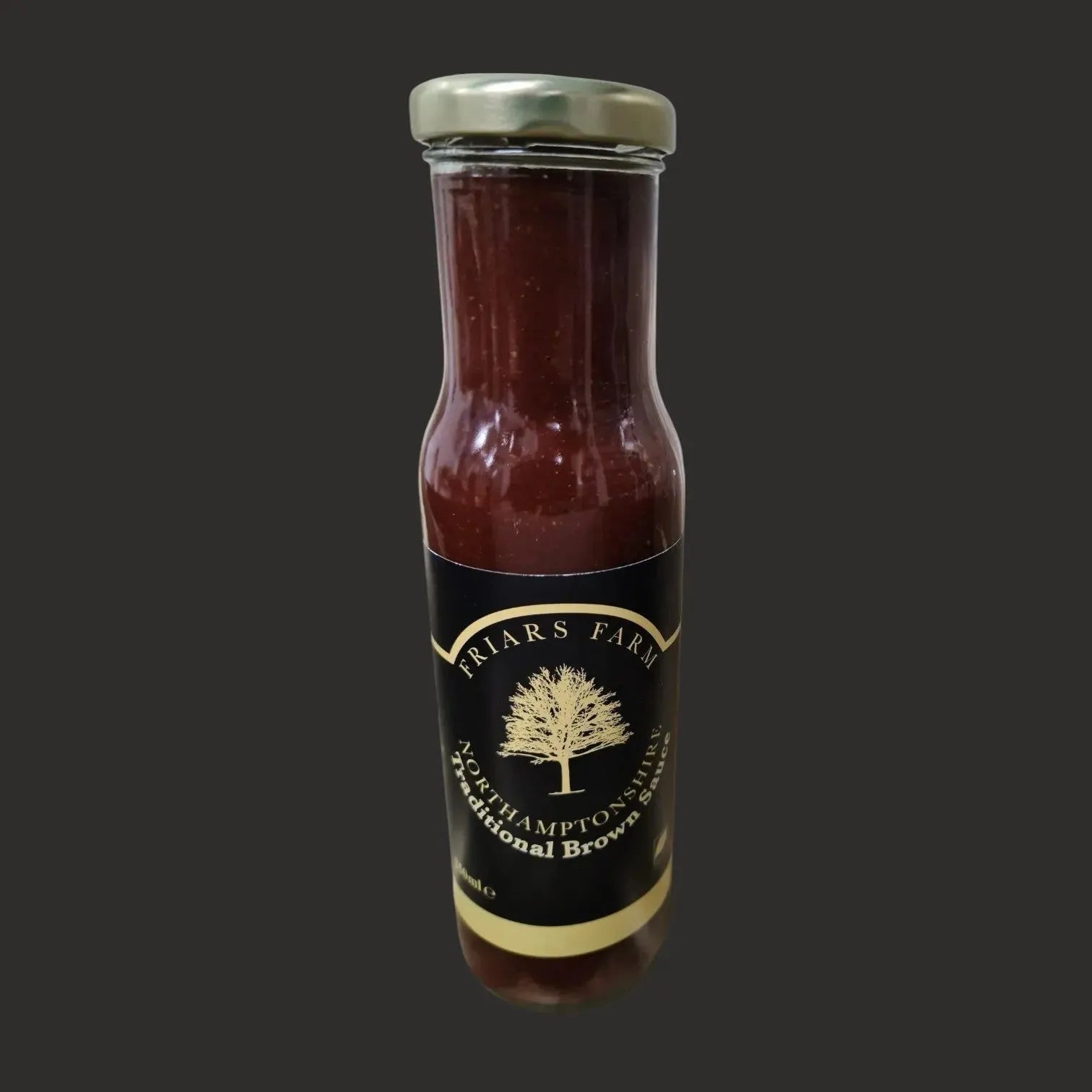 Traditional brown sauce by Friars Farm in a glass bottle, showcasing a rich, dark brown condiment with a smooth, glossy texture.