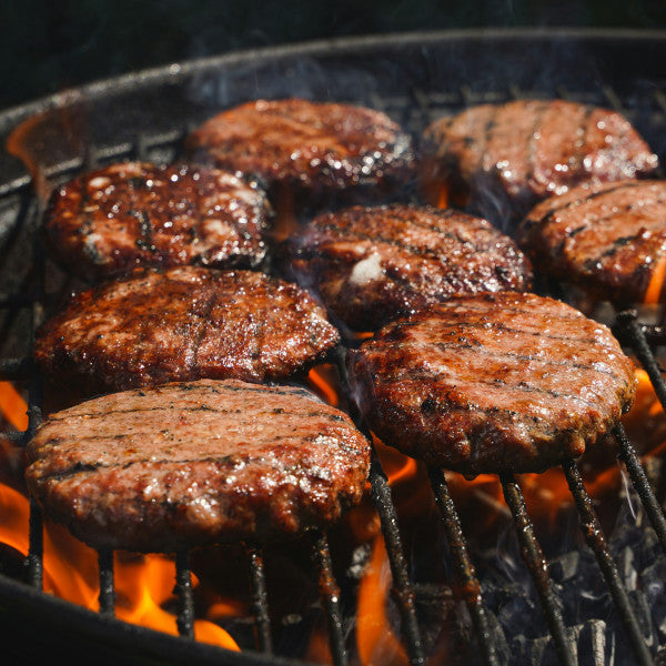 Goodness in a Bowl burger seasoning rub in a jar, with spices and herbs visible, ideal for adding flavor to burgers.
