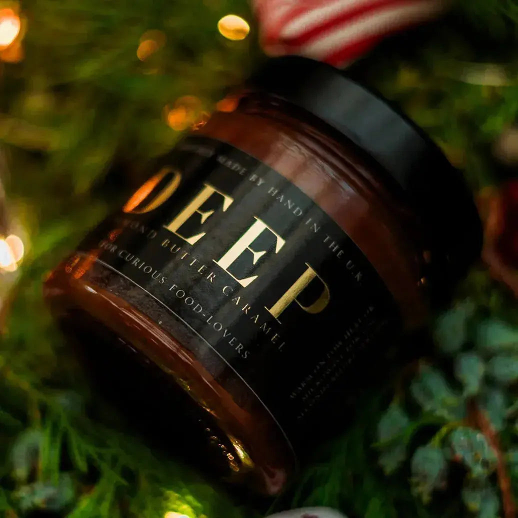 Creamy DEEP Almond Butter caramel nut butter spread with rich caramel swirls and smooth almond texture.