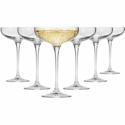 Set of six Krosno champagne saucers with 240ml capacity, clear glass flutes filled with champagne, ideal for celebrations.