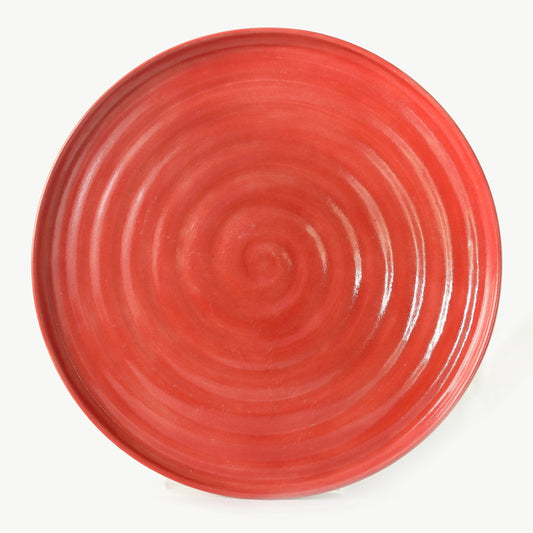 Cherry red dinner plate by Katie L Thompson Designs with a smooth, glossy finish and classic round shape.