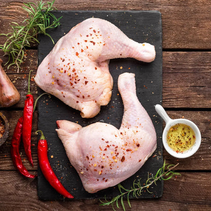 Primrose Herd Creedy Carver free-range chicken legs, raw and fresh with skin, ready for cooking or roasting.