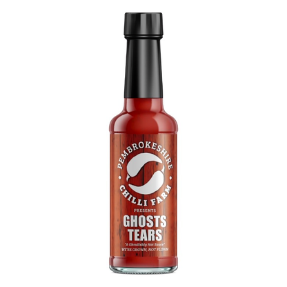 Pembrokeshire Chilli Farm Ghost Tears chilli sauce bottle with fiery red sauce in a glass container.