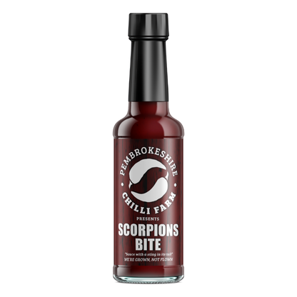 Pembrokeshire Chilli Farm Scorpions Bite Chilli Sauce bottle with fiery red sauce and label showing a scorpion illustration.