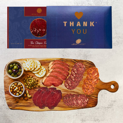 Bray Cured Classic Feasting Five charcuterie selection on a wooden serving board with meats, cheeses, and accompaniments.