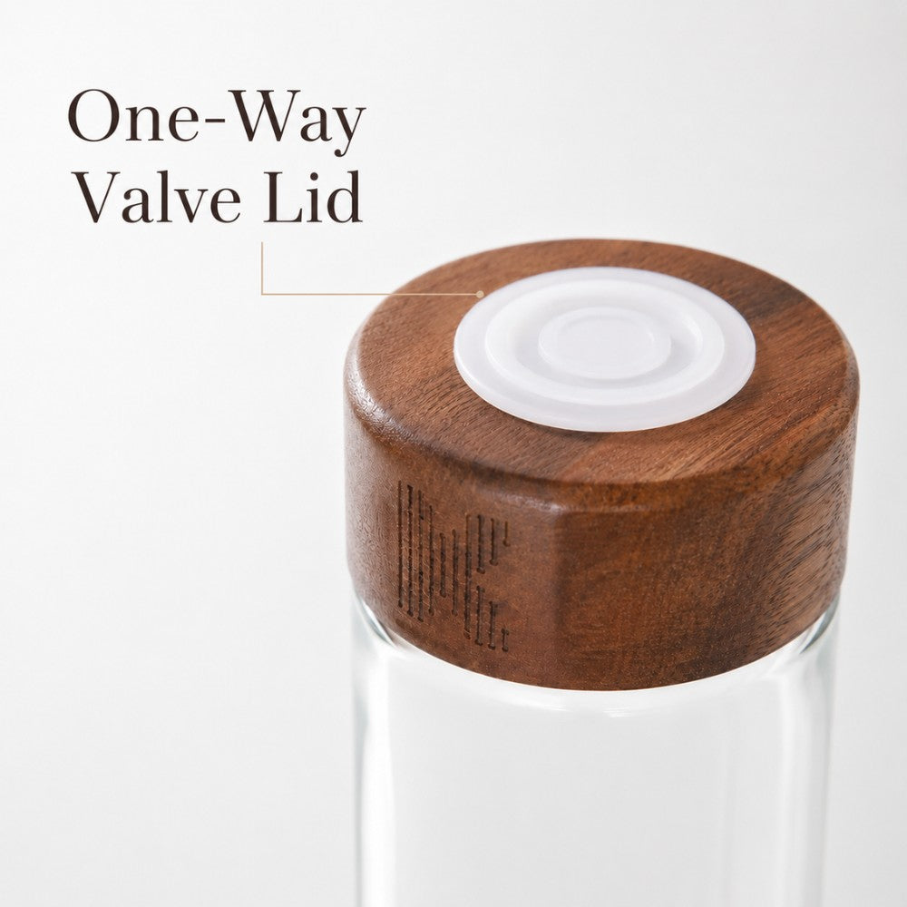 Set of walnut coffee bean display tubes with exhaust valve lids, featuring clear glass containers and wooden caps for fresh storage.