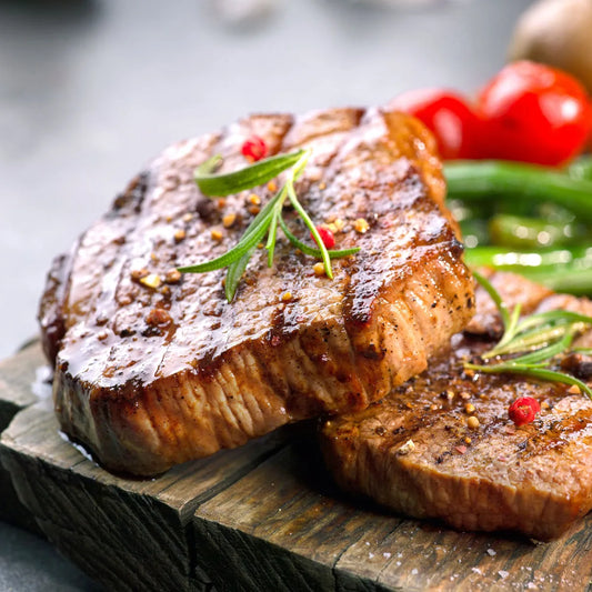 Cooked beef fillet from Primrose Herd, showcasing tender, perfectly prepared beef fillet slices on a white plate.