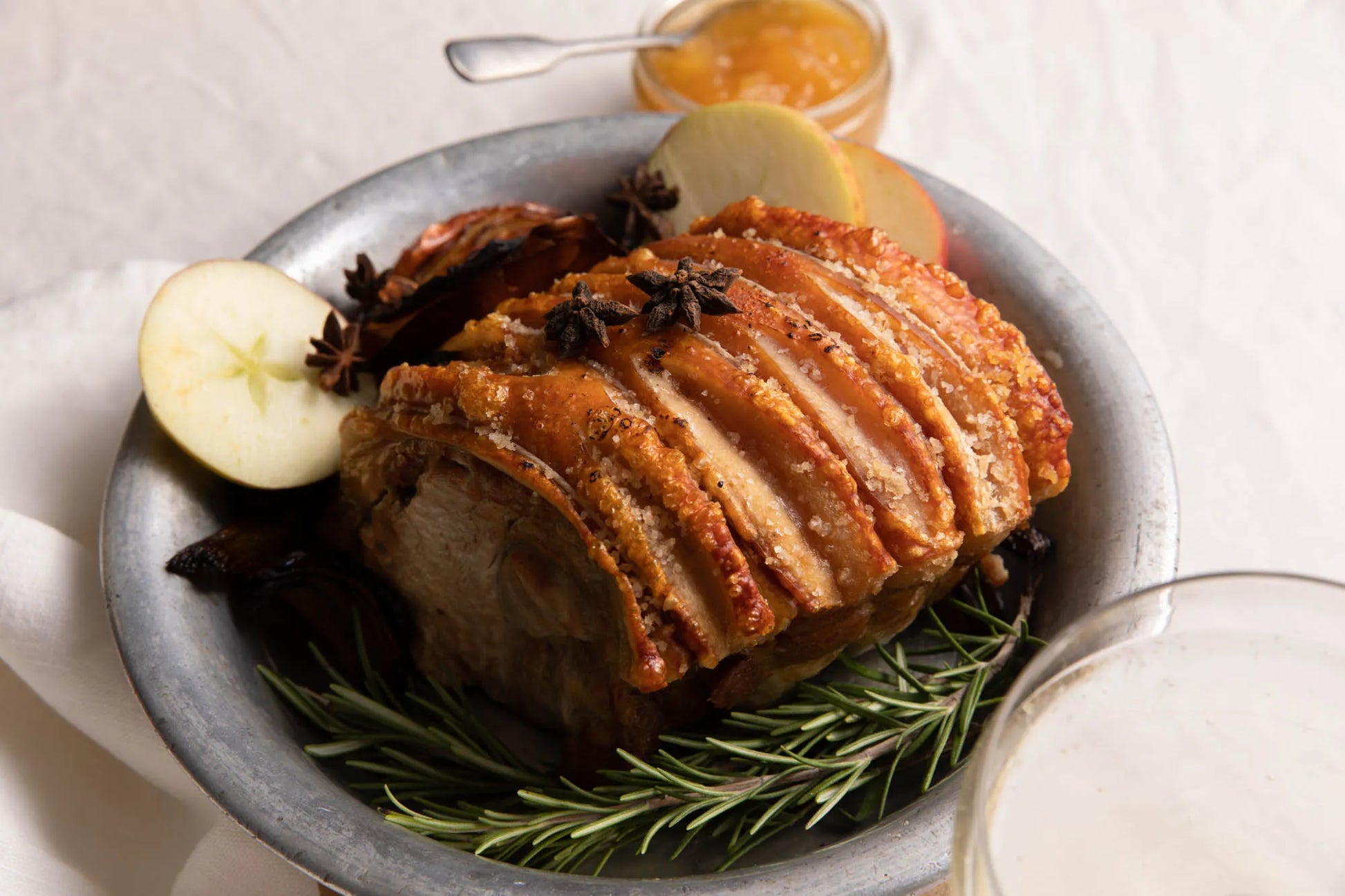 Cooked pork shoulder joint from Primrose Herd, showcasing a juicy, tender collar joint ready for serving.