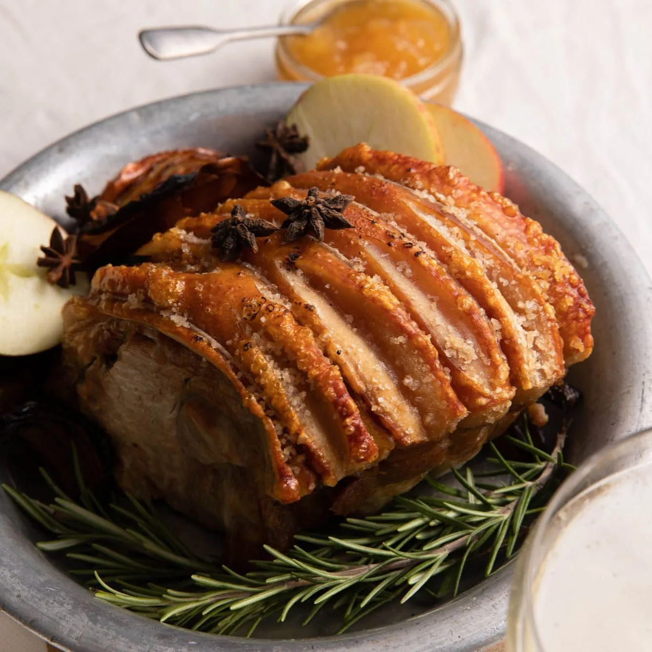 Cooked pork shoulder joint from Primrose Herd, showing a tender, juicy pork joint ready for serving.