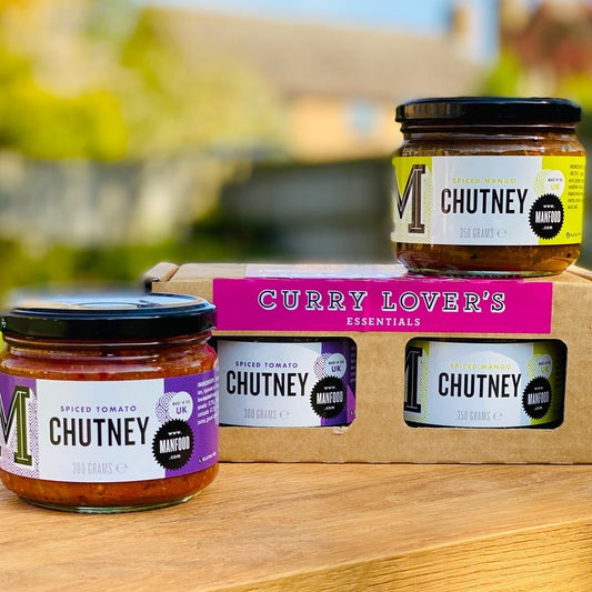 Manfood Curry Lover's Chutney Essentials Gift Set in a decorative box, featuring various chutneys for curry accompaniments.