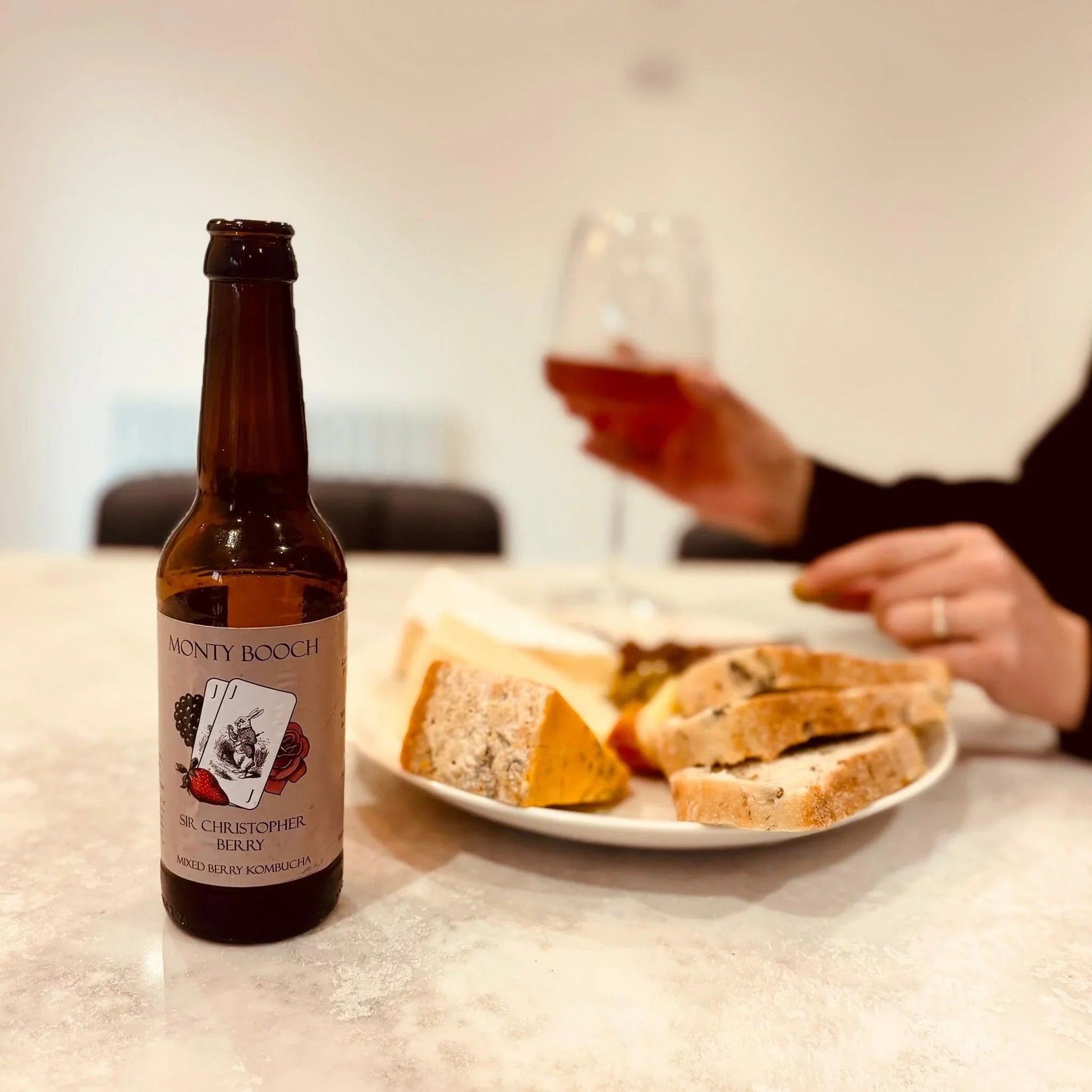 Monty Booch Sir Christopher Berry Raw Kombucha 330ml bottle with mixed berry flavor, unfiltered and natural in appearance.