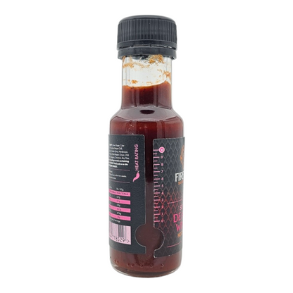 FireFly Barbecue 7 Deadly Wings Hot Sauce bottle with fiery red sauce inside, featuring bold label design.