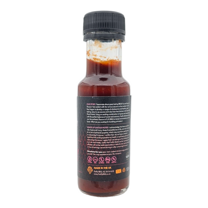 Bottle of FireFly Barbecue 7 Deadly Wings Hot Sauce with a fiery label, showcasing a spicy hot sauce product.