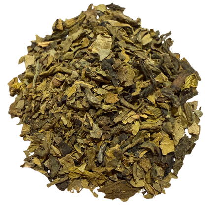 Decaf Kyushu Sencha green tea leaves from Porter Hill Tea Company, displayed in a transparent container.